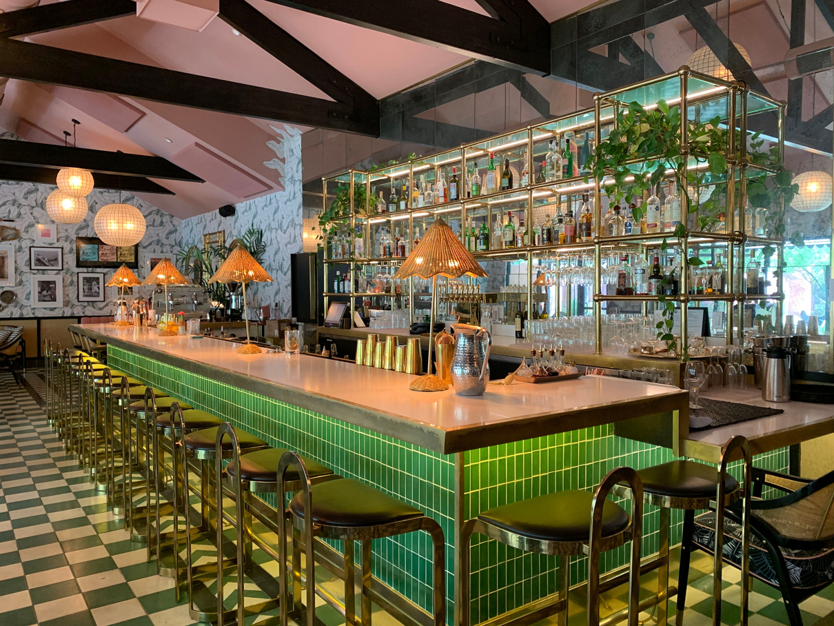 The green-tiled bar at The Pink Cabana restaurant at The Sands hotel in Indian Wells.