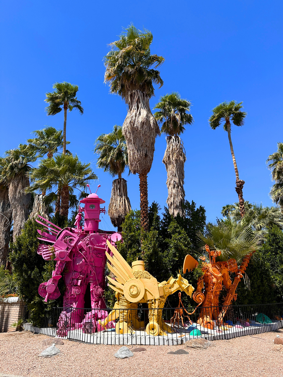 Shot of three colorful robot statues outside of the Robolights house in Palm Springs.