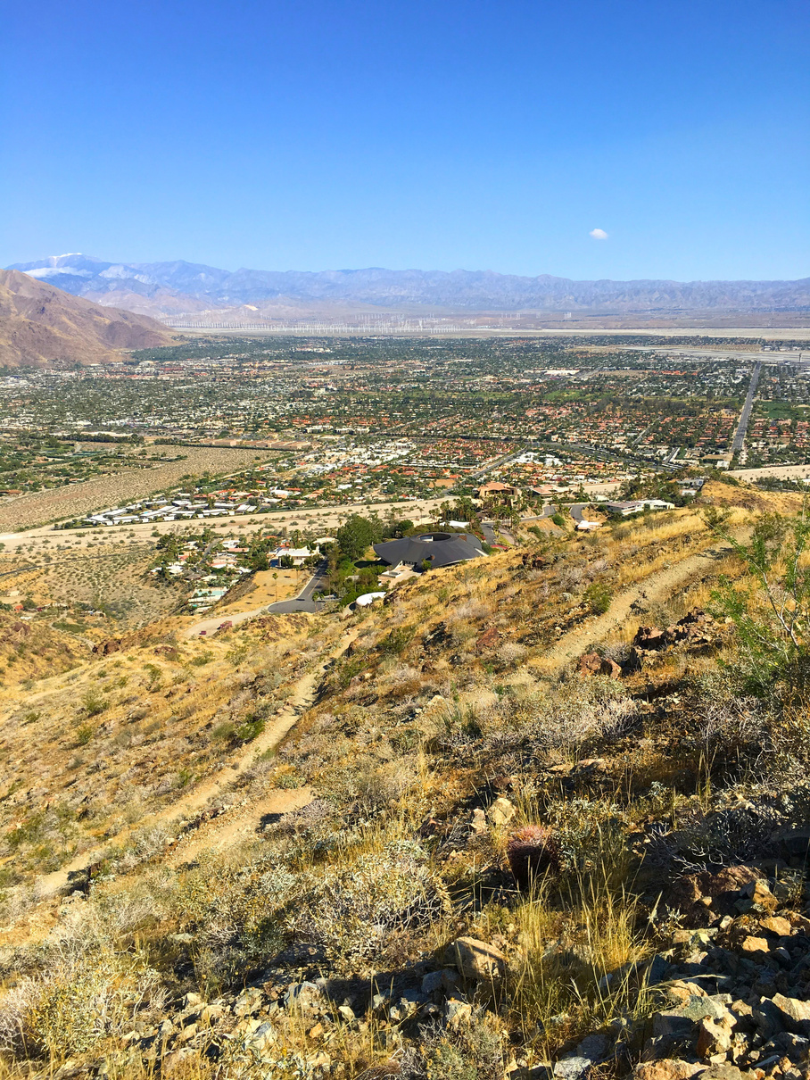 View from the top of Araby Trail hiking trail in Palm Springs, showing Bob Hope's famous flying-saucer-shaped house.