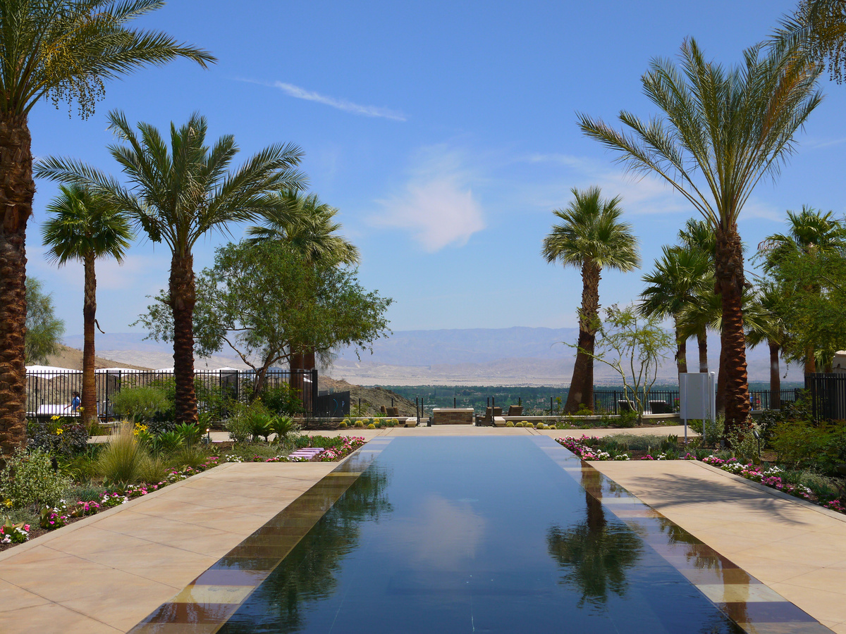 A large fountain/reflecting pool at The Ritz-Carlton, Rancho Mirage, with a view of the surrounding valley.